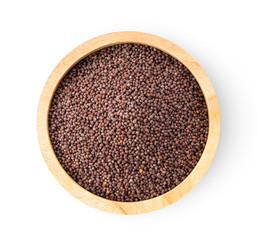 mustard seeds in wood bowl  isolated on white background