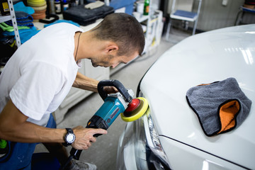 Car polishing details in workshop stock photo