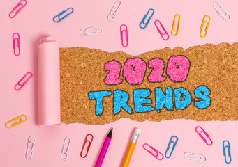 Writing note showing 2020 Trends. Business concept for things that is famous for short period of...