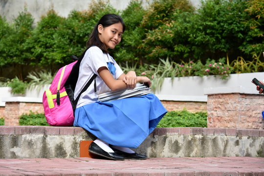 A Young Filipina Girl Student Relaxing