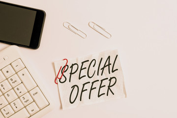 Text sign showing Special Offer. Business photo showcasing Discounted price Markdown Promotional Items Crazy Sale White pc keyboard with empty note paper above white background and mobile phone