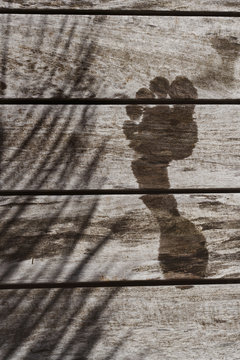 Foot trace on wood