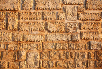 Ancient stone old wall background, antique textured exterior