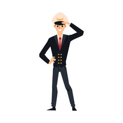 Obraz premium Male airline pilot in black uniform and flight captain hat standing and saluting