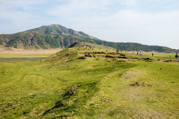 Obraz premium Landscape at Mount Aso (Aso-san), the largest active volcano in Japan stands in Aso Kuju National Park.