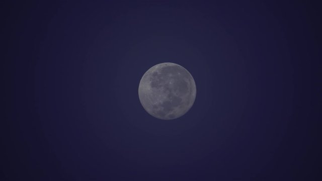 The moon on the farthest night of the year Falling behind the fog Take pictures from lens 750 mm. Fast speed 4x