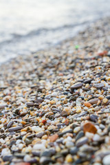 Sea stones on the seashore in the summer