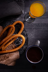 breakfast with churros, hot chocolate and orange juice