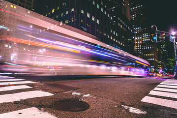 Capturing a moving bus with 1/4 shutter speed. New York.