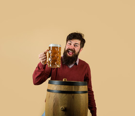 Brewery concept. Brewer. Bearded man hold glass with delicious ale. Oktoberfest festival. Bearded man drinking ale. Craft beer at restaurant. Man tasting draft beer. Beer pub and bar. Beer in Germany.