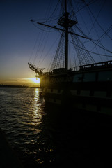   River landscape.  A ship under the night sky. Saint-Petersburg, Russia. White night with a pink sky over the Neva 
