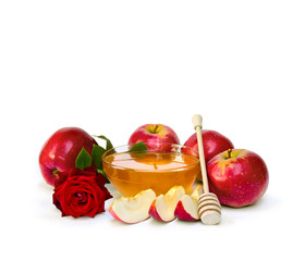 Honey, red apples, red rose on a white background with space for text