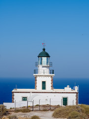 Fototapeta na wymiar Akrotiri Lighthouse (Faros) with clear sky - Santorini Greece