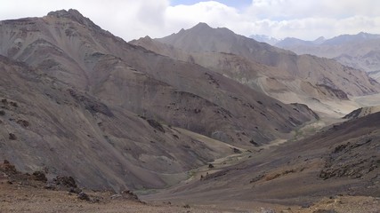 Fototapeta na wymiar Trekking from Pshart valley through Gumbezkul pass to Madiyan in Tajikistan Pamir highway