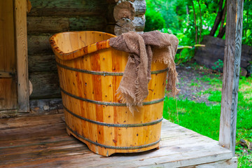 Old Russian bath made by hand from a tree for washing and relaxing in nature far from the bustle of...