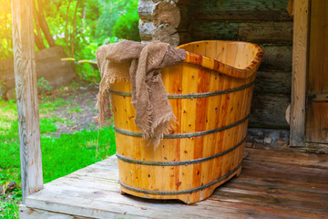 Old Russian bath made by hand from a tree for washing and relaxing in nature far from the bustle of...