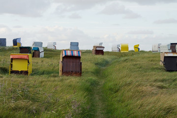 Colorful wooden beach chairs in Cuxhaven (Duhnen), Germany