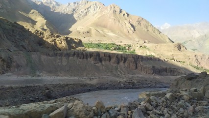 View on Wakhan Corridor in Afghanistan behind the Wakhan river. Taken from Pamir highway on Tajikistan side.