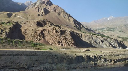 View on Wakhan Corridor in Afghanistan behind the Wakhan river. Taken from Pamir highway on Tajikistan side.