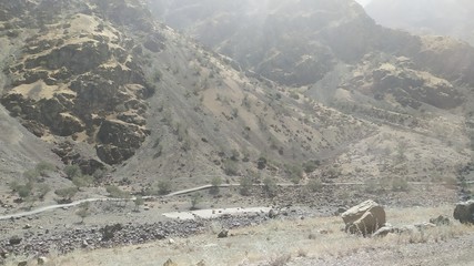 Fototapeta na wymiar View on Wakhan Corridor in Afghanistan behind the Wakhan river. Taken from Pamir highway on Tajikistan side.