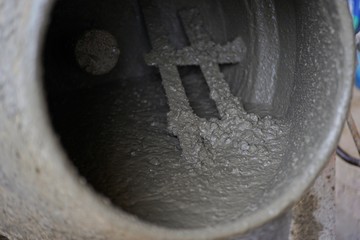 Closeup concrete mixer at the construction site