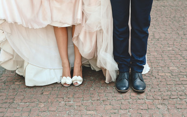 feet bride and groom wedding walk outside