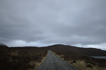 Fototapeta na wymiar Lonely road on the Isle of Skye, Scotland