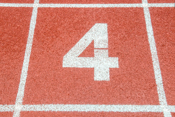 The number 4 at the start or finish position   on race track