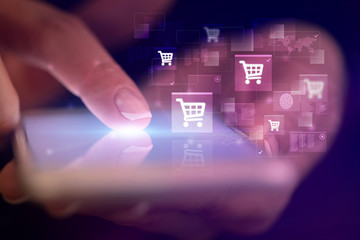 Finger touching phone with online shopping concept and dark background