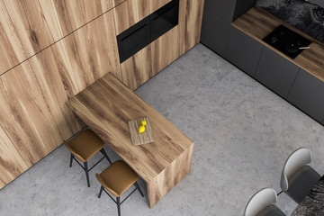 Top view of gray and wooden kitchen interior