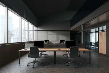 Dark gray open space office with meeting room