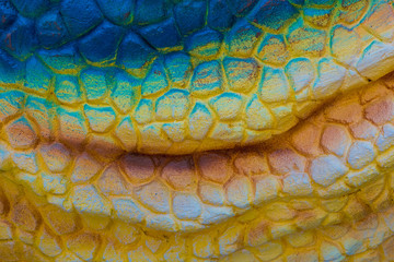 Close up to Colorful and patterns of  dinosaur model surfaces created with cement