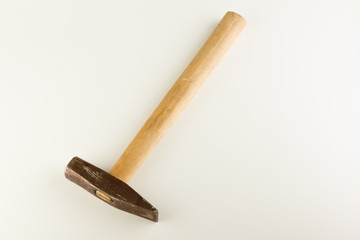 hammer with wooden handle isolated on a white background
