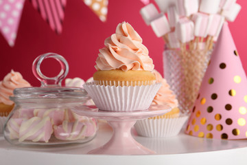 Tasty cupcake and other sweets on table. Candy bar, closeup view