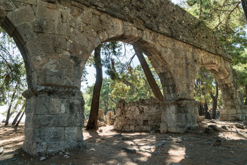 Naklejka premium The remains of Roman aqueducts in ancient city of Phaselis, Antalya province,Turkey