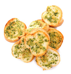 Slices of toasted bread with garlic, cheese and herbs on white background, top view