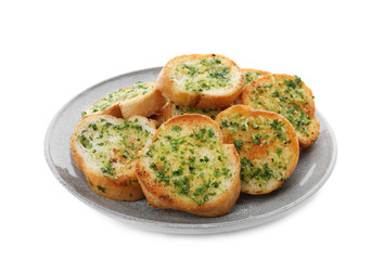 Slices of toasted bread with garlic and herbs on white background