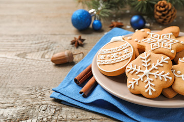 Tasty homemade Christmas cookies on wooden table