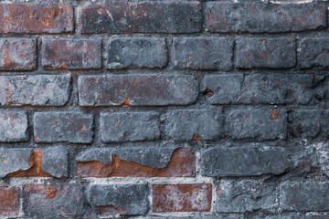 Old brick wall. Abstract gray dirty wall. Grunge texture. Dark vintage brickwork. Concrete stone background.