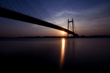 Fototapeta na wymiar Sunset at 2nd Hooghly Bridge Kolkata West Bengal India