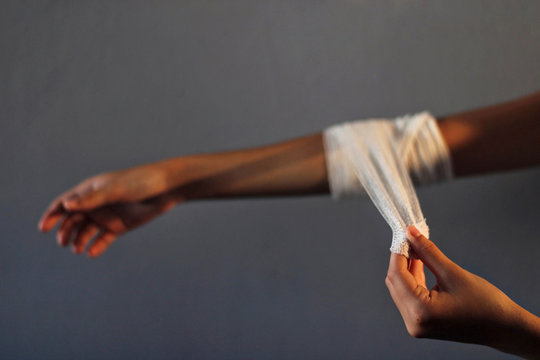 Bandage in sale hand