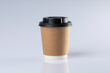 Cardboard coffee cup with lids. White background.