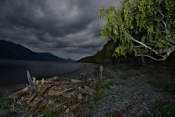 Full moon at the end of summer. Russia, South Of Western Siberia, Altai Mountains. Altai state natural biosphere reserve, Bele cordon in the South of lake Teletskoye. 