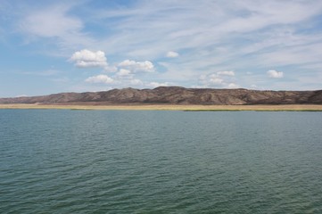 Landscape with lake and blue sky