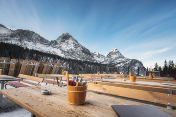 Outdoor restaurant in the snowy Alps mountains