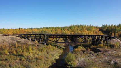 The old bridge was built by prisoners of Stalin's prison camps Stalin 501-th construction of the GULAG. Railway "Chum - Salekhard - Igarka"