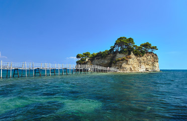 Obraz premium Wooden bridge to the island of Agios Sostis on the island of Zakynthos in Greece.