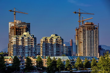 Fototapeta premium New construction of Apartment Buildings on the waterfront in Downtown of New Westminster city 