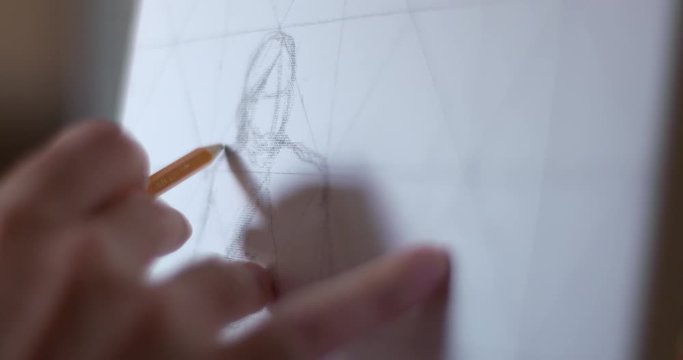 Creative artist sketches human figure portrait on white canvas life drawing