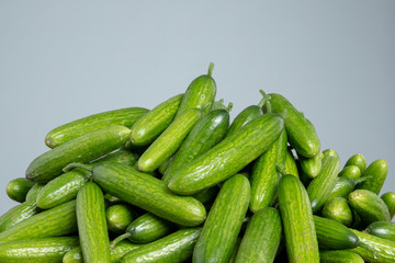 Cucumbers on the grey isolated background